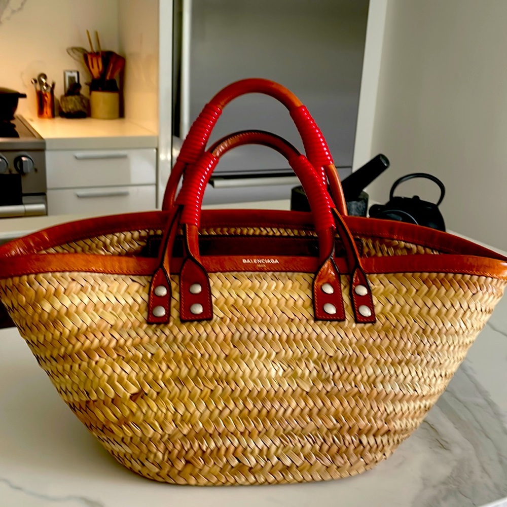 Balenciaga raffia bag.  Natural raffia color with cognac leather trim.